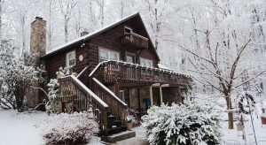 Log Home with Snow